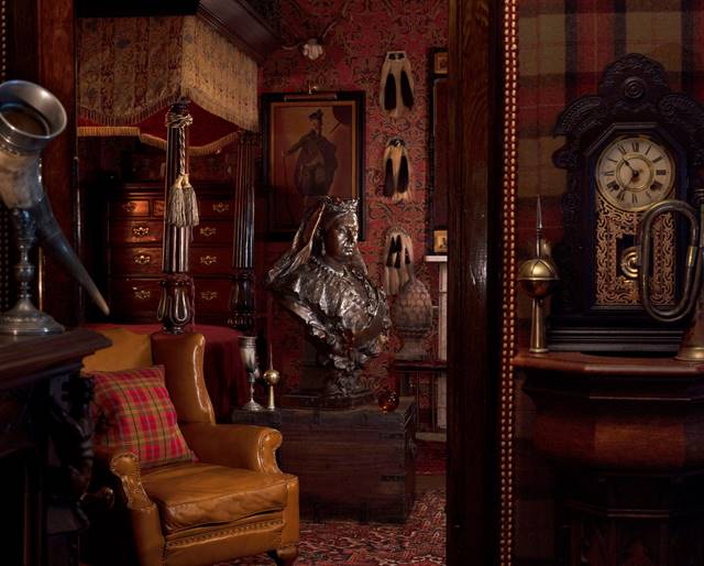 Inner Sanctum - Antique drinking horn, bust, clock and trumpet in James Thompson's red and gold gothic hotel suite