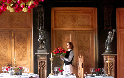 The Secret Garden at The Witchery with a server serving food