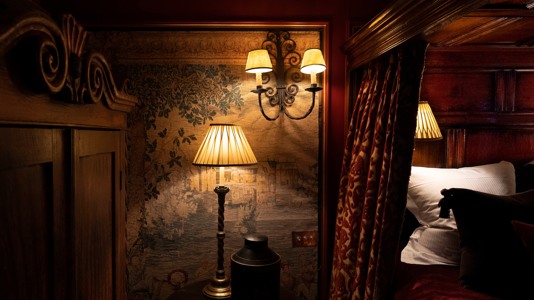 Sumptuous bedroom in a gothic-inspired suite at The Witchery with four poster bed