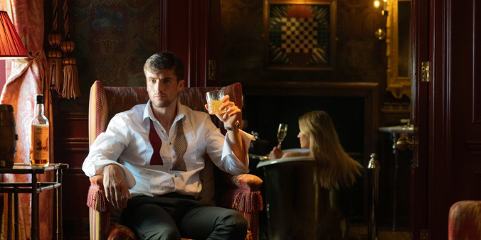 Luxurious suite at The Witchery with ornate furnishings and warm ambient lighting