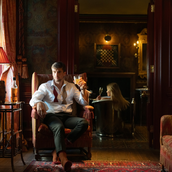 Luxurious suite at The Witchery with ornate furnishings and warm ambient lighting