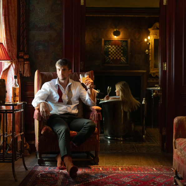 Luxurious suite at The Witchery with ornate furnishings and warm ambient lighting