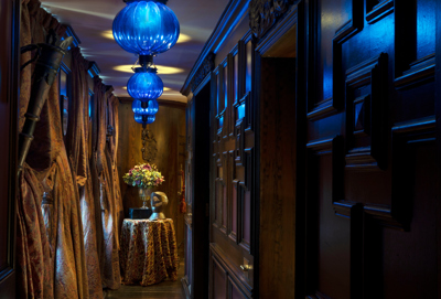 Wooden door in The Armory Room at The Witchery