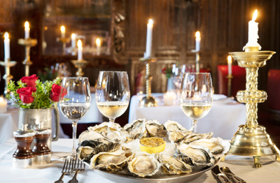 Plate of seafood and wine at The Witchery Edinburgh