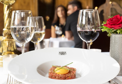 Food and glasses of wine at The Witchery