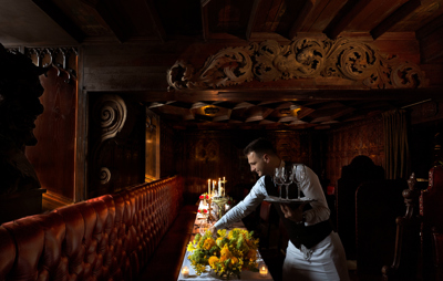 Waiter serving table in The Witchery Edinburgh