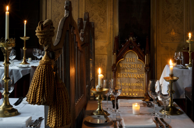 Inside the restaurant at The Witchery with original Witchery sign