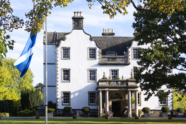 Prestonfield in Autumn with the Saltire Flag