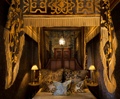 The bed front on in The Heriot Suite in The Witchery